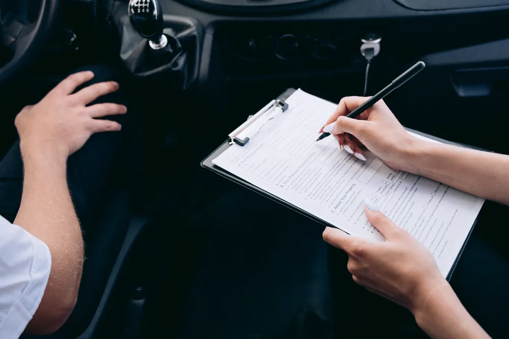 Filling out a car financing application in Canada