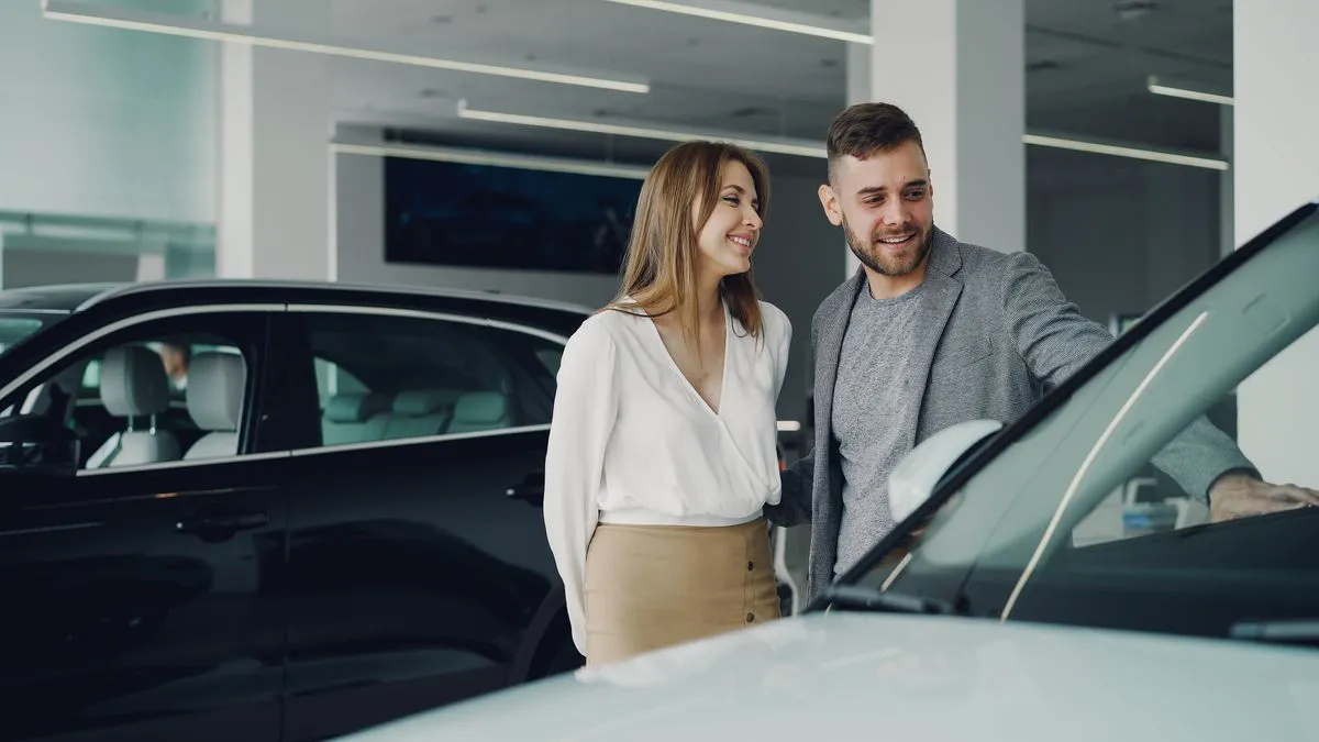 Ontario couple choosing a vehicle with car loans Ontario financing