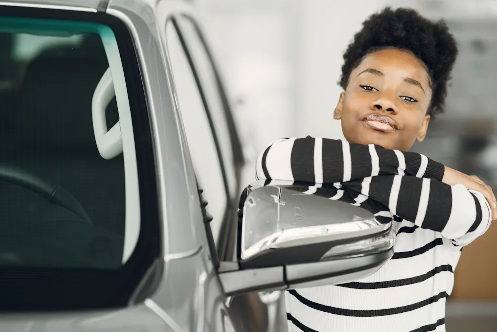 No credit car loans Canada: young driver with her first financed car
