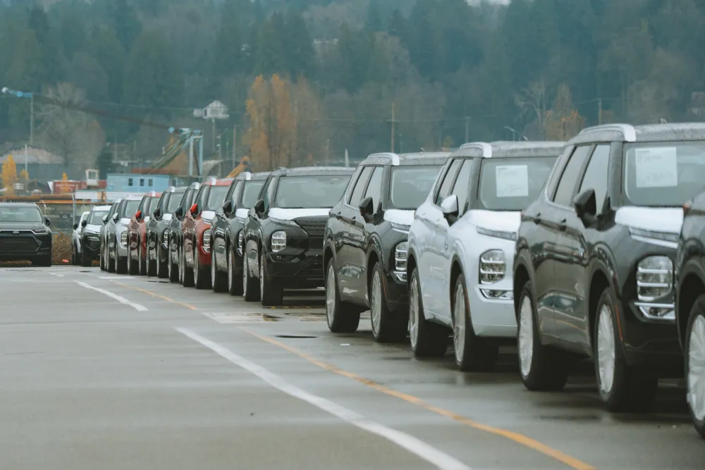 Row of new SUVs at a Canadian dealership lot for vehicle financing
