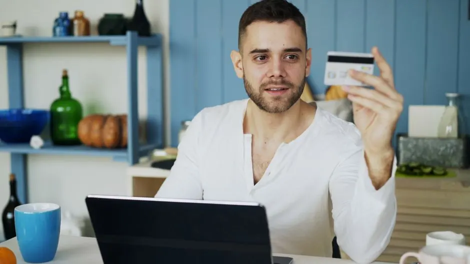 Applying online for car loan pre-approval from home with a laptop