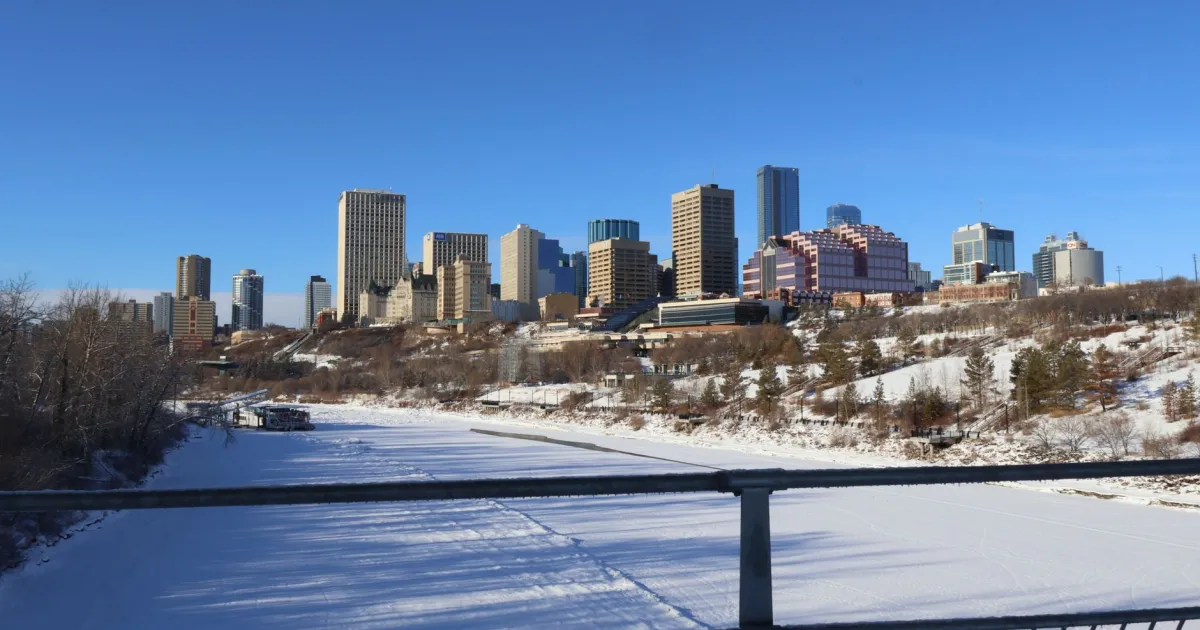Bad credit car loan Edmonton: downtown skyline over the frozen North Saskatchewan River