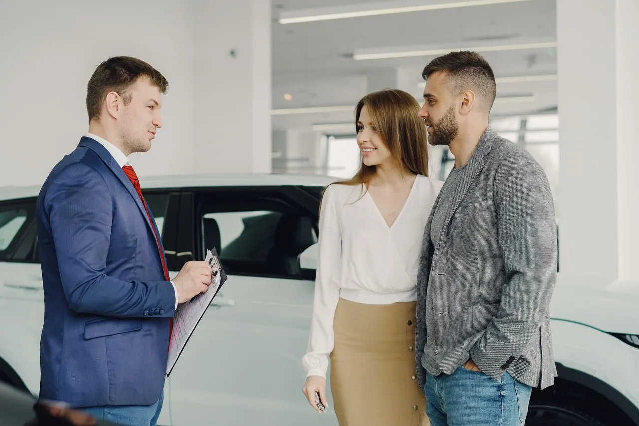 Couple asking a lender when a car loan cosigner is required