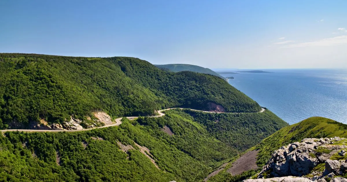 Car loans Nova Scotia: the Cabot Trail cutting along the Cape Breton coast