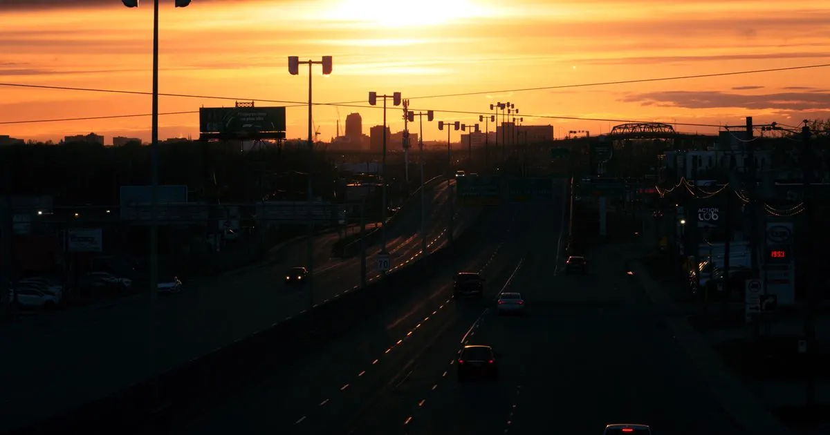 Car loans Quebec: sunset over a Montreal highway full of commuters