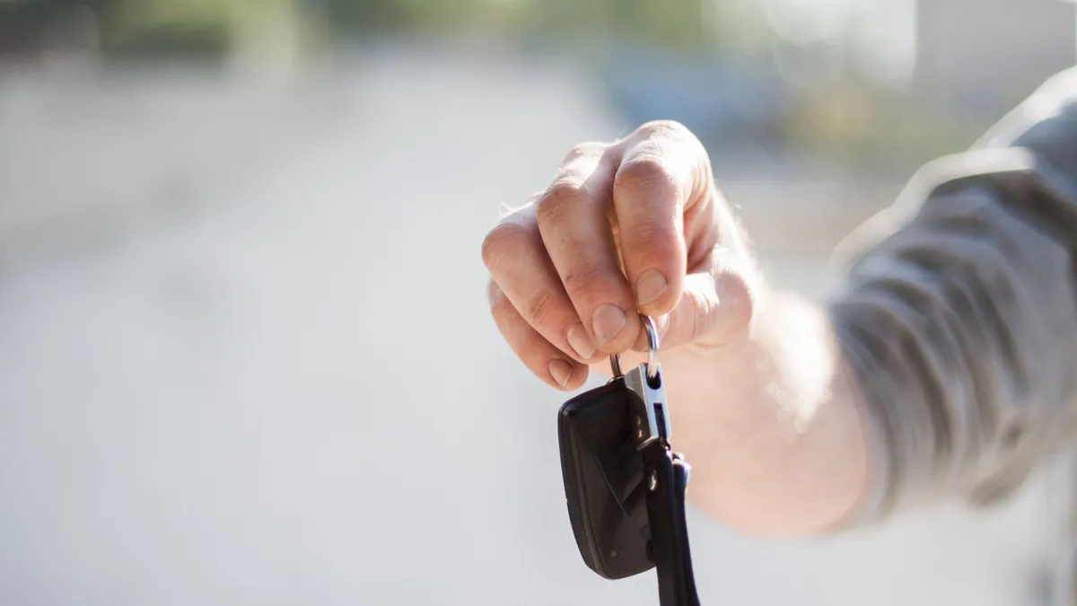 Car keys handed over after the bill of sale is signed